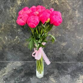 Букет из 11 розовых пионов